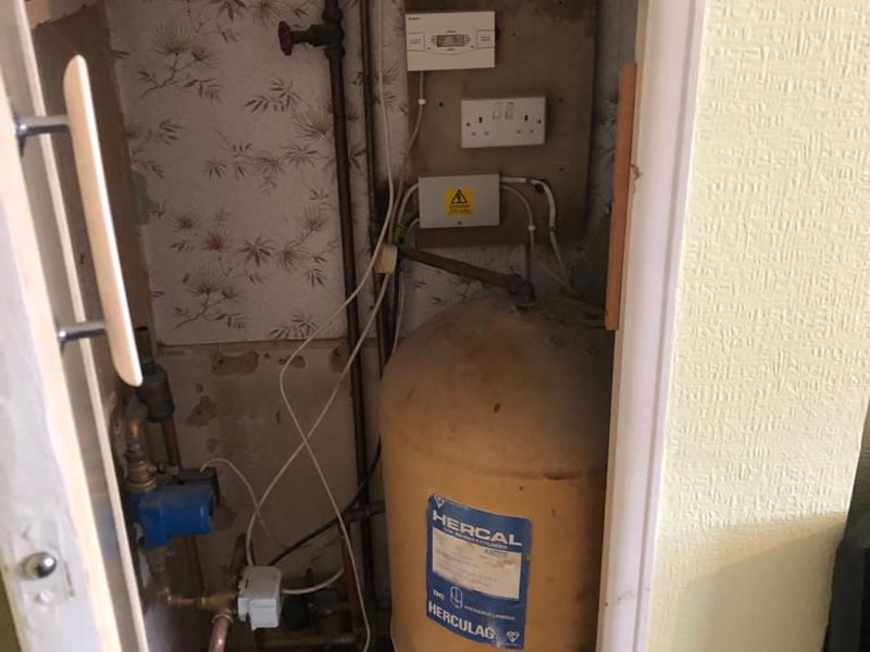 Old back boiler water cylinder before removal
